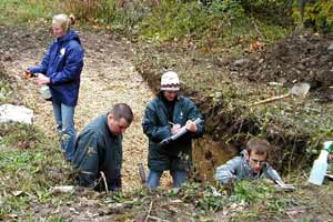 Soil judging team at work in a soil pit