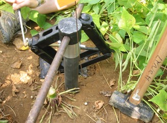 Car jack used to pull out soil corer