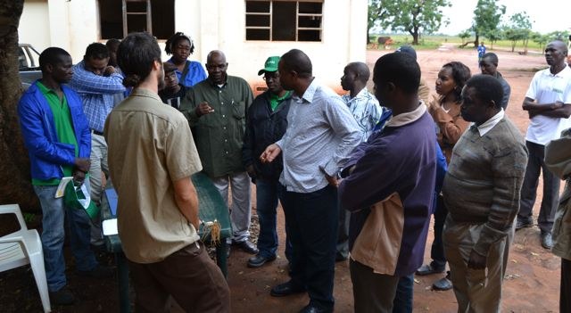 Jimmy and Luis talking with Vice Minister of Agriculture of Mozambique and IIAM leadership at a field visit to Sussundenga Research Station, Mozambique.