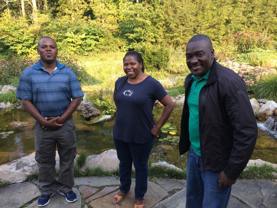 Bean researchers from IIAM (Mozambican Agriculture Research Institute) and graduates of the Lynch Lab, Magalhaes Miguel, Celestina Jochua and Sam Camilo, share a meal in State College before the CRIB annual meeting at Penn State University.