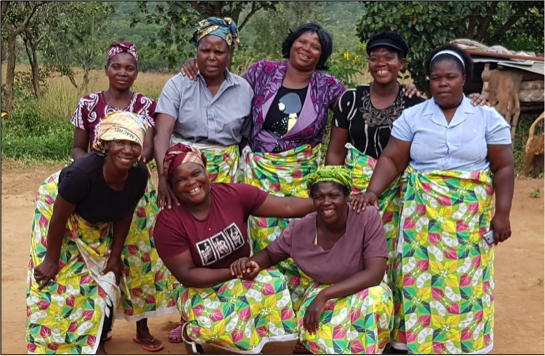 The Rotanda, Central Mozambique pilot group in the bean-patterned capalana fabric to be used as part of the pilot promotional campaign.