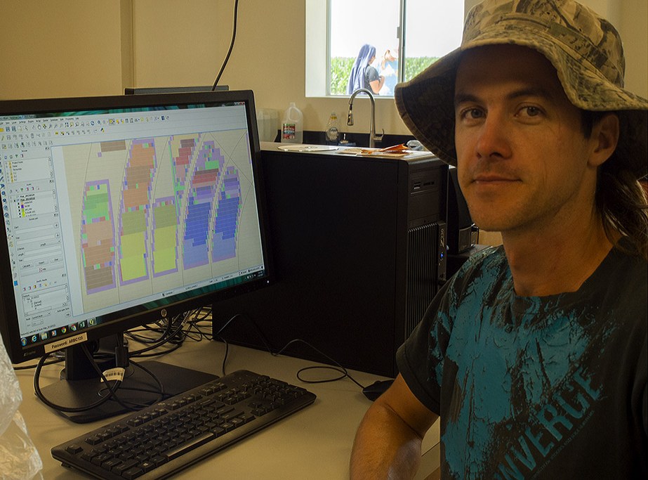 Jimmy Burridge displays the 2015 plot layout map for use under the irrigation pivot.