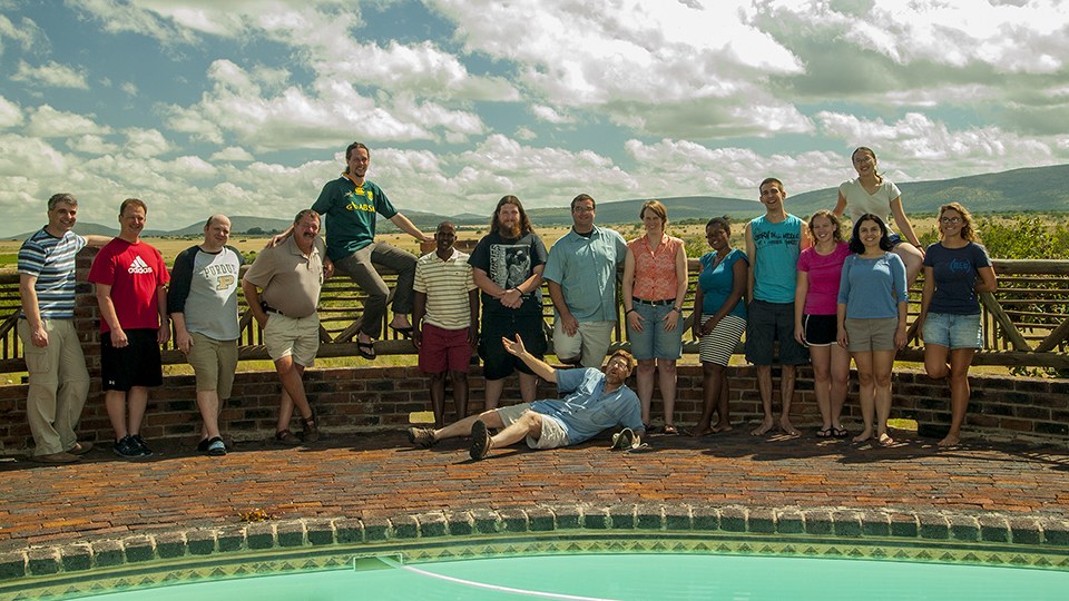 The Roots lab researchers, interns, and collaborators gather at the Ukulima Root Biology Center to evaluate bean and maize roots in Feb 2014, the group's final year at this field site.  Photo courtesy of Bob Snyder.