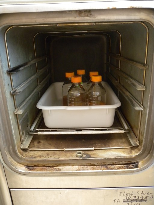 Place container in an autoclave and heat to 121C for 15 minutes.