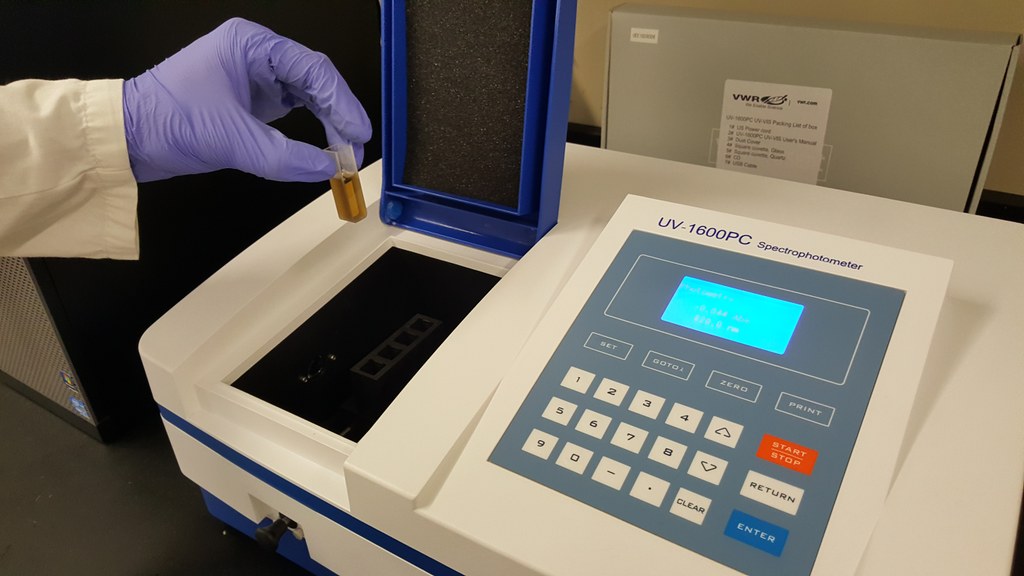 Spectrophotometer being used for the analysis of total sugar content in cover crop plant tissue samples